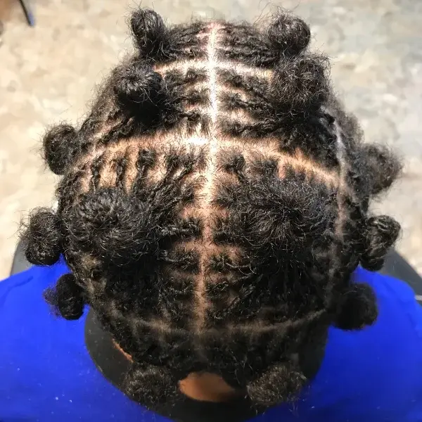 Bantu knots and grid pattern — installation day preparation